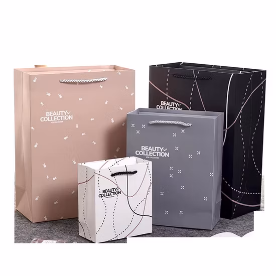 Amostra grátis logotipo personalizado saco de papel de papelão rosa de luxo com alça de fita